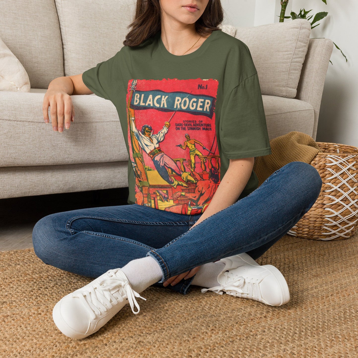Close-up of the black soft cotton fabric displaying the seamless collar and relaxed fit neckline detail from an overhead