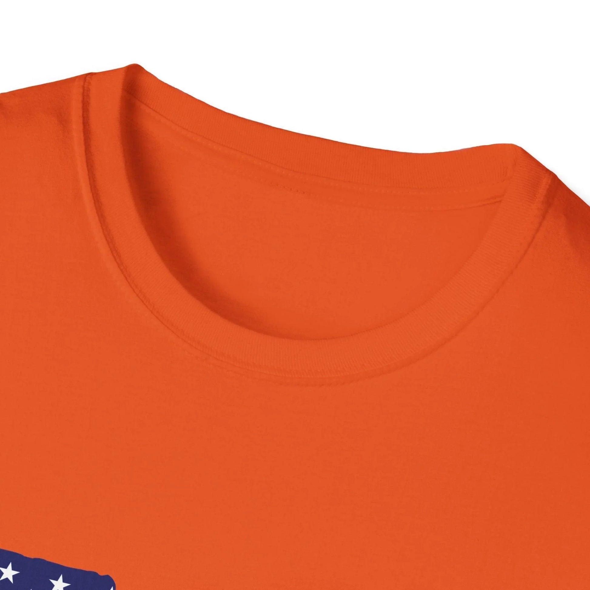 Close-up of American flag guns graphic on soft cotton fabric, highlighting vibrant colors and detailed print on the chest
