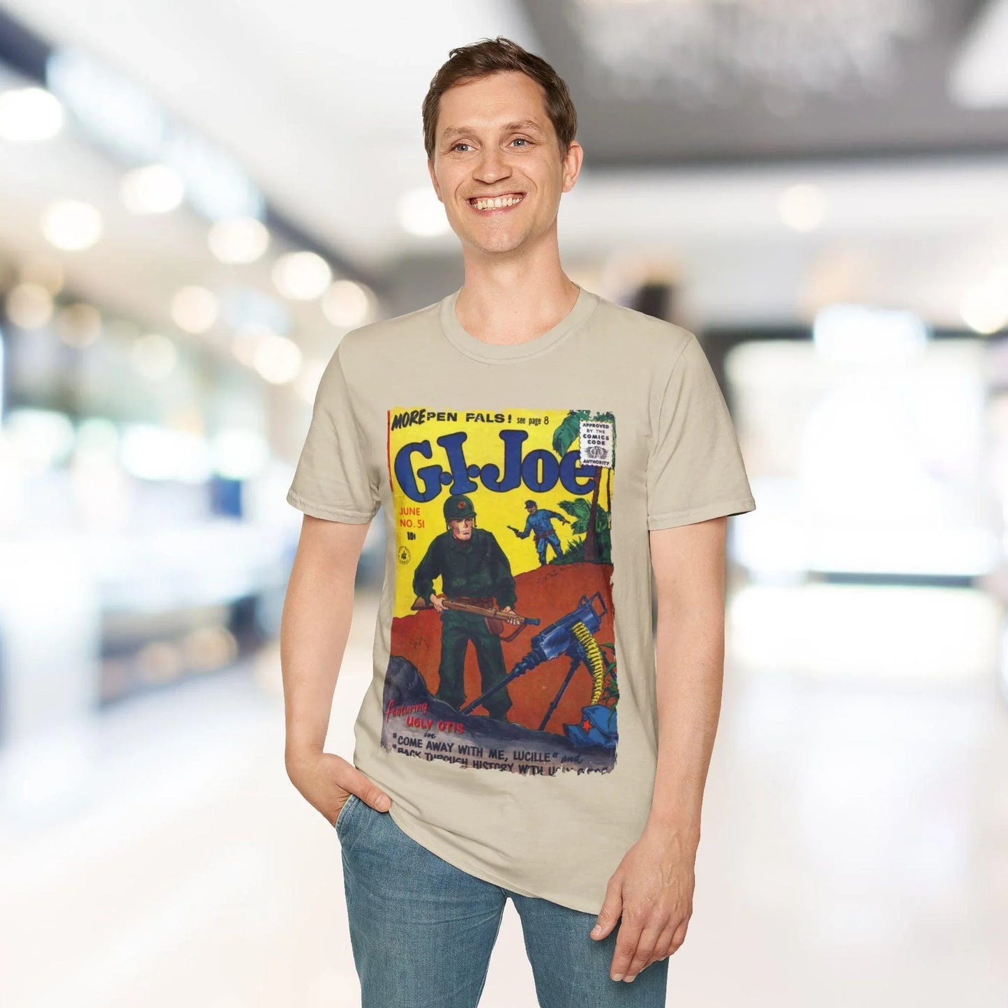 Close-up of the G.I. Joe No.51 softstyle fabric tag on a relaxed fit, khaki-colored T-shirt featuring a ribbed crew neckline