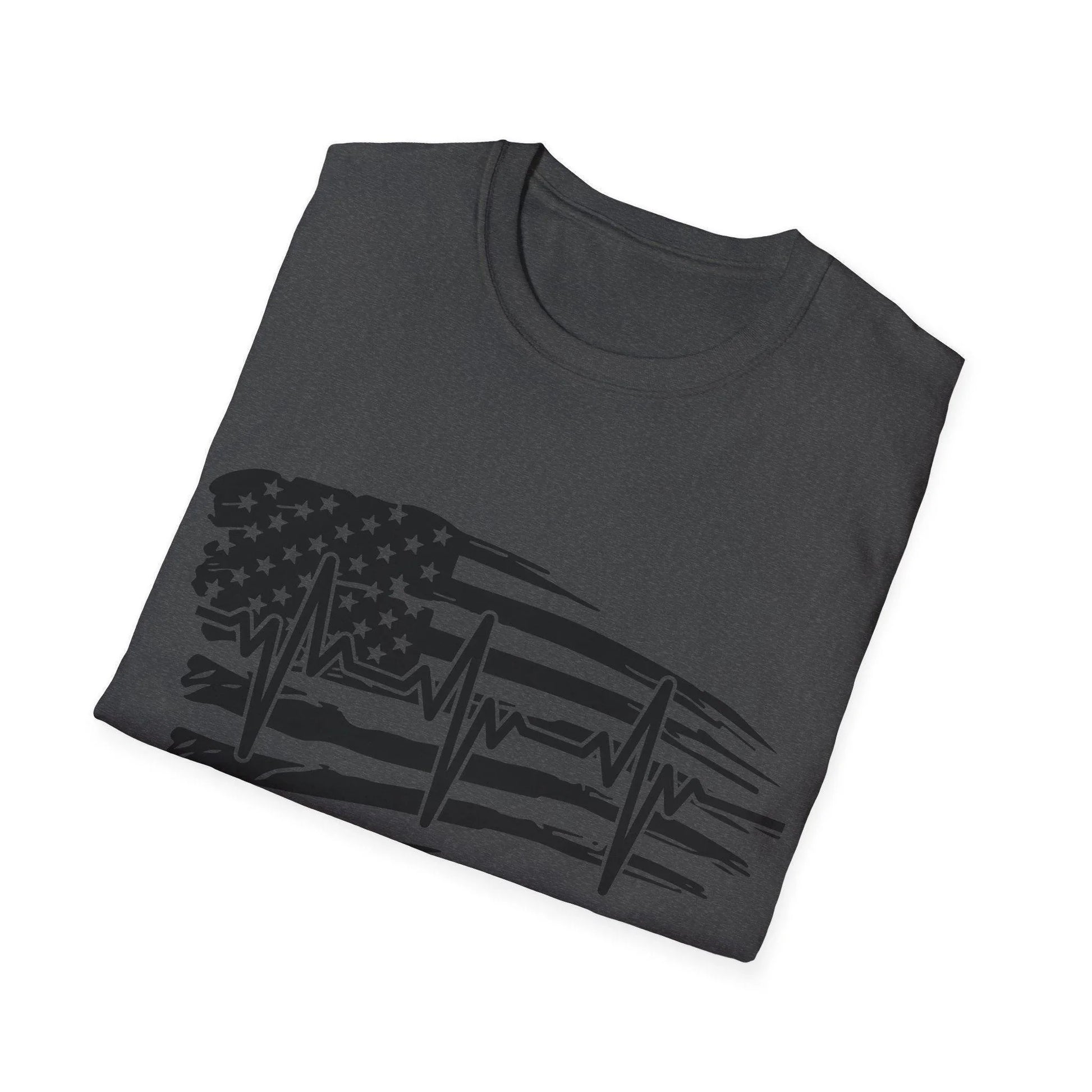 Close-up of black distressed flag heartbeat graphic on soft cotton fabric, highlighting texture and worn design details.