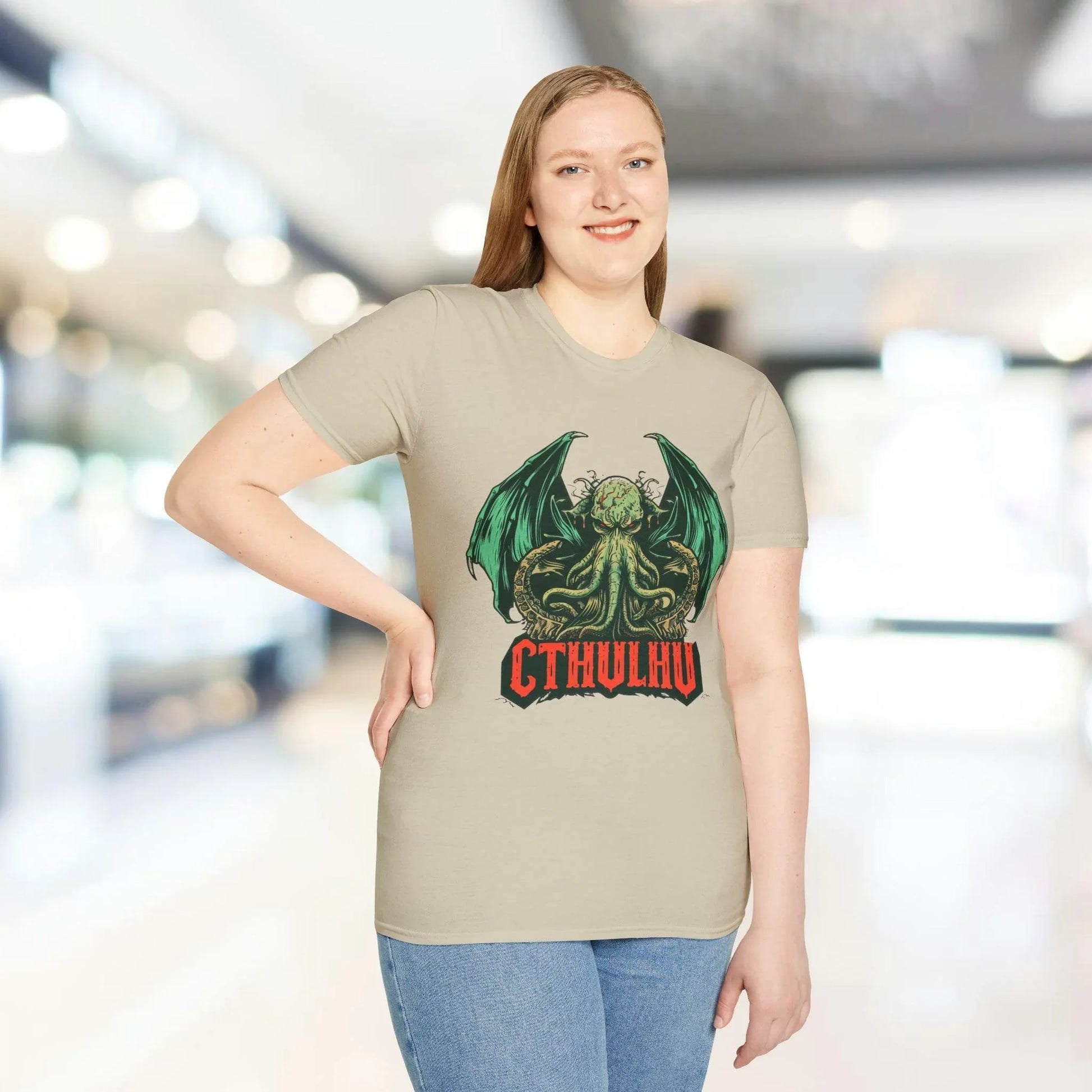 Close-up of the Cthulhu graphic on the relaxed fit dark navy unisex T-shirt's chest pocket area, highlighting detailed ink