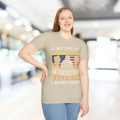 Close-up of the unisex softstyle fabric tag on the back neckline, showcasing the smooth white cotton blend and neat