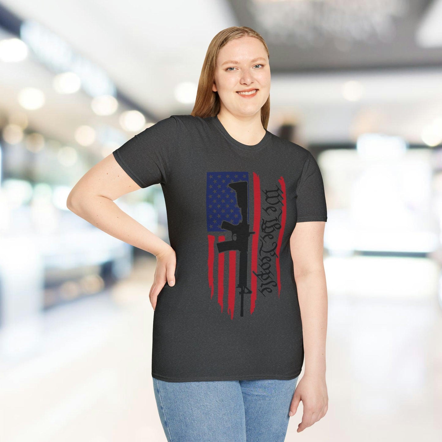 Close-up of distressed American flag design showcasing faded red and white stripes on soft cotton fabric with crew neckline