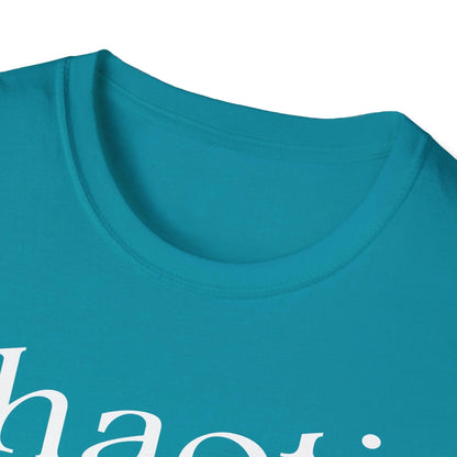 Close-up of the white cotton fabric displaying smooth, relaxed fit with visible stitching along neckline and sleeve edge.