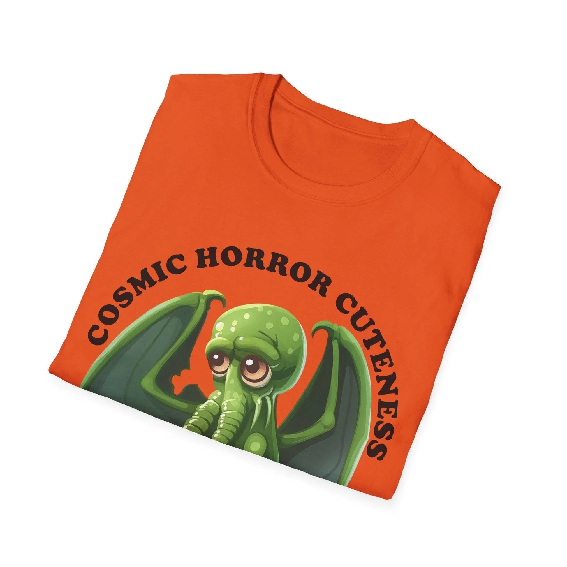 Close-up of the Cosmic Horror Cuteness T-Shirt’s soft cotton fabric showing vibrant galaxy-inspired print at the hem from a