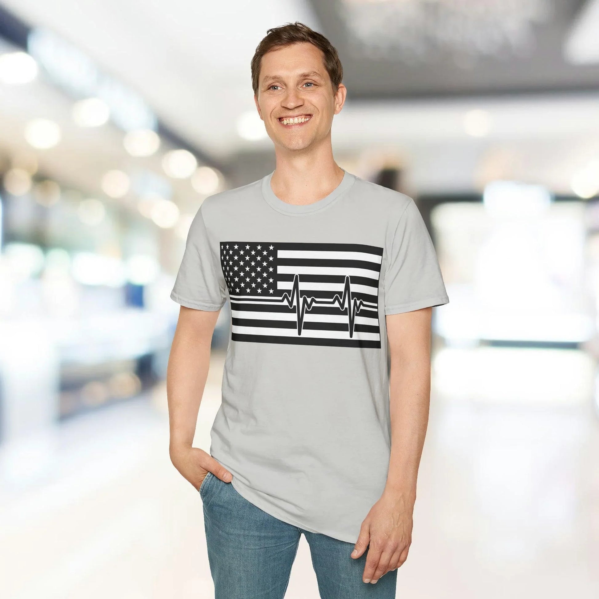 Close-up of the unisex black and white American Flag Heartbeat T-shirt displaying the soft cotton fabric texture and subtle