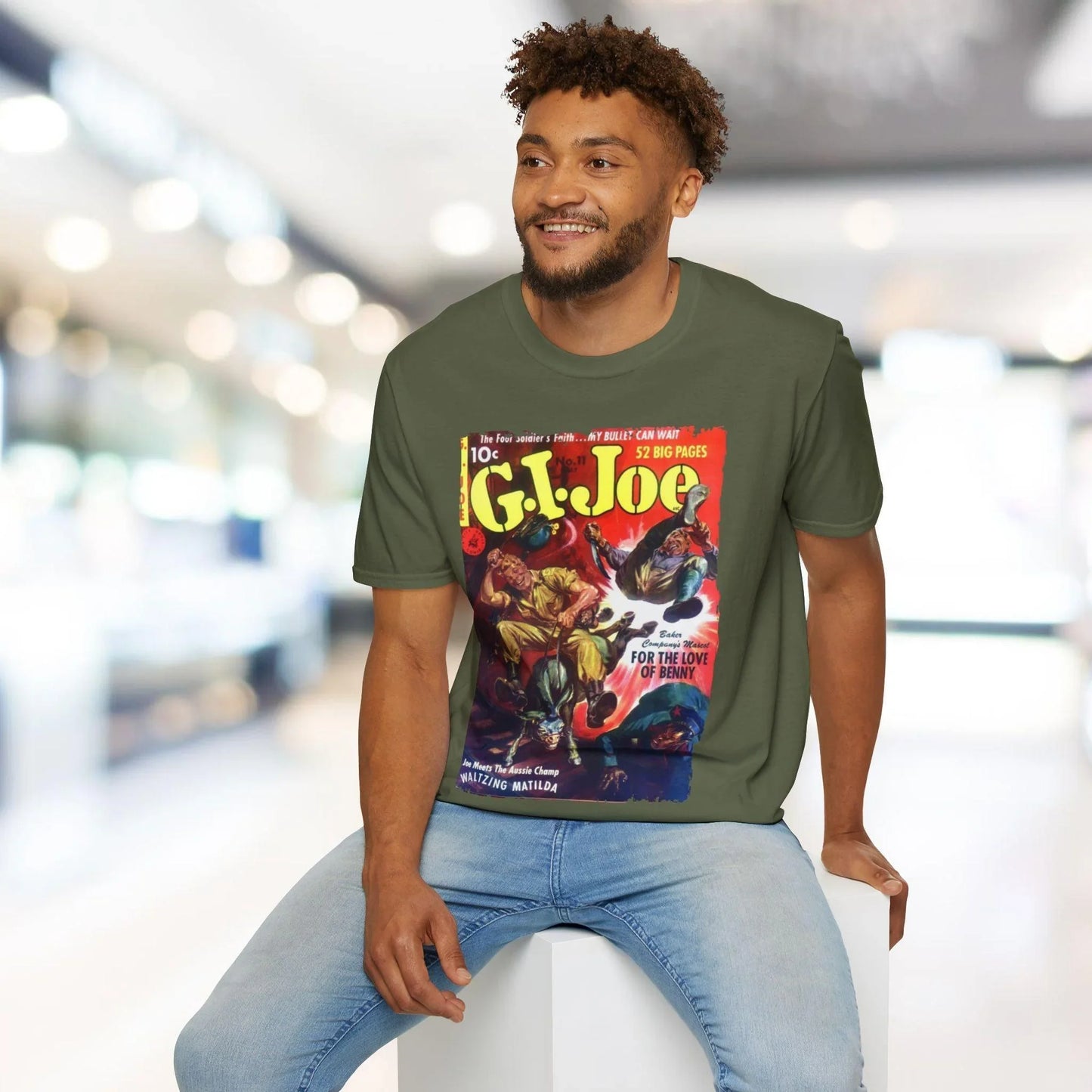 Close-up of the G.I. Joe No.11 softstyle T-shirt’s fabric weave and subtle heather texture in olive green from a slightly