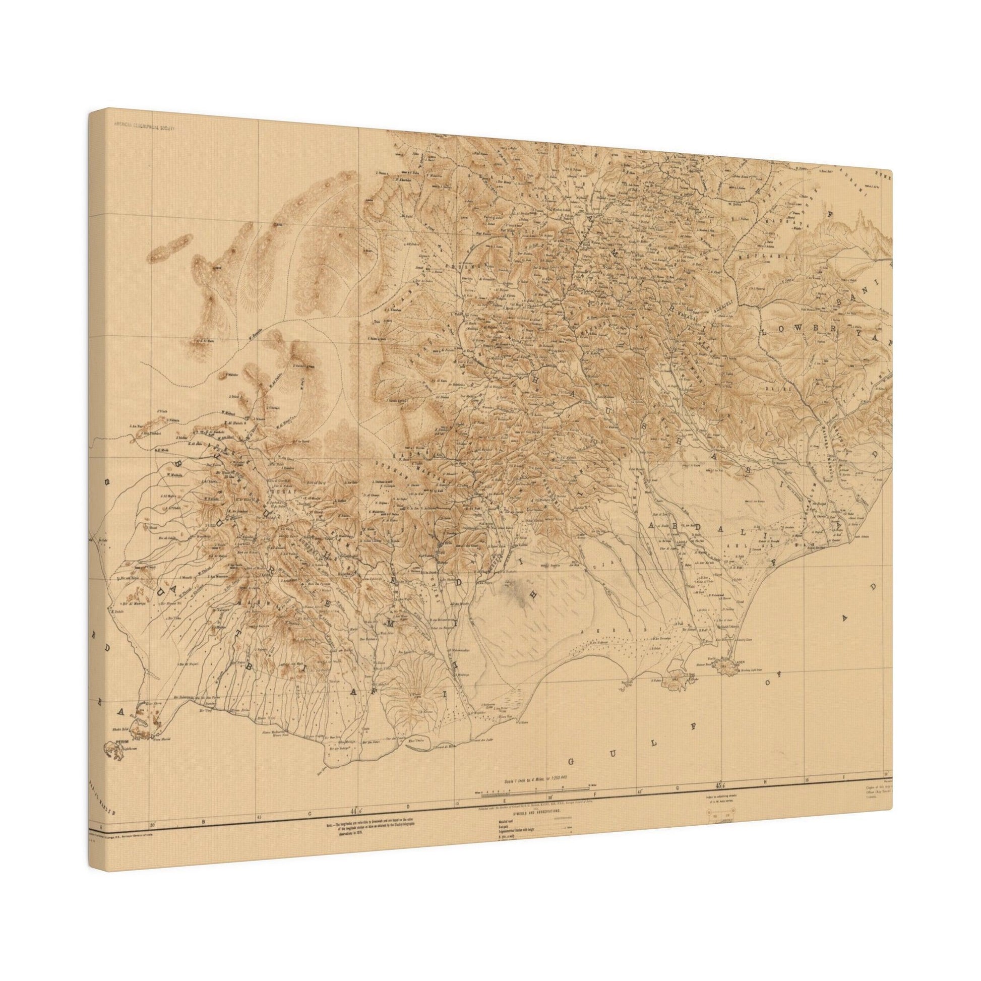 Close-up of detailed map texture highlighting desert terrain and subtle ink markings on Aden Protectorate canvas.