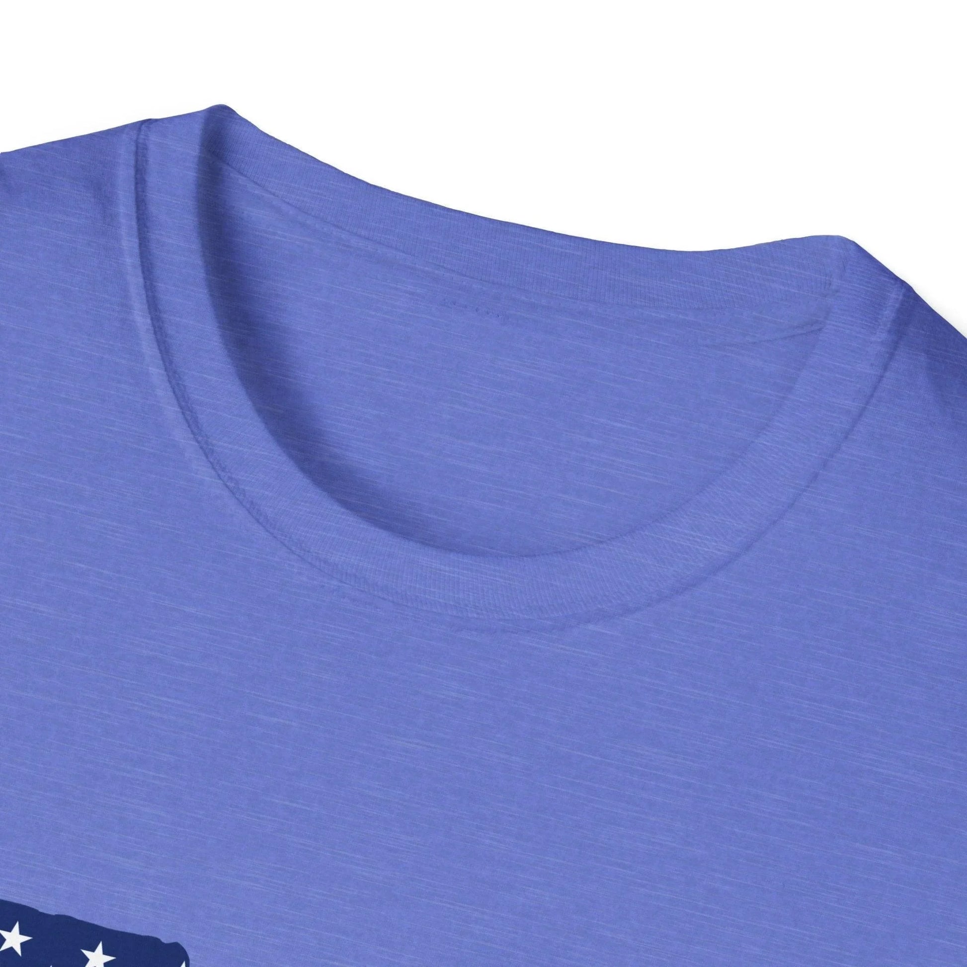Close-up of the American flag Guns graphic printed on the relaxed fit, cotton T-shirt's chest area, highlighting vibrant