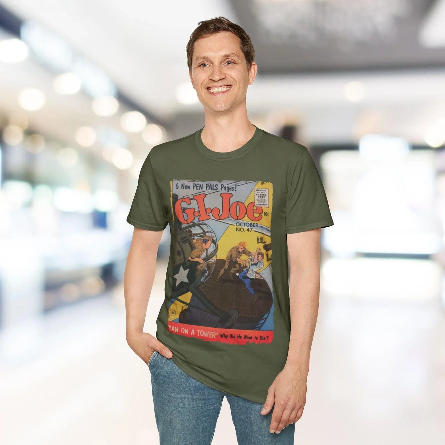 Close-up of the T-shirt neckline highlighting the soft cotton fabric and reinforced stitching on a relaxed fit, light blue