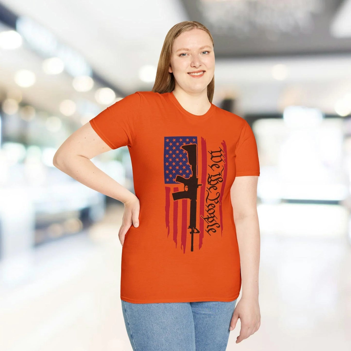 Close-up of the distressed American flag graphic on the chest of the relaxed-fit, soft cotton T-shirt showing textured print