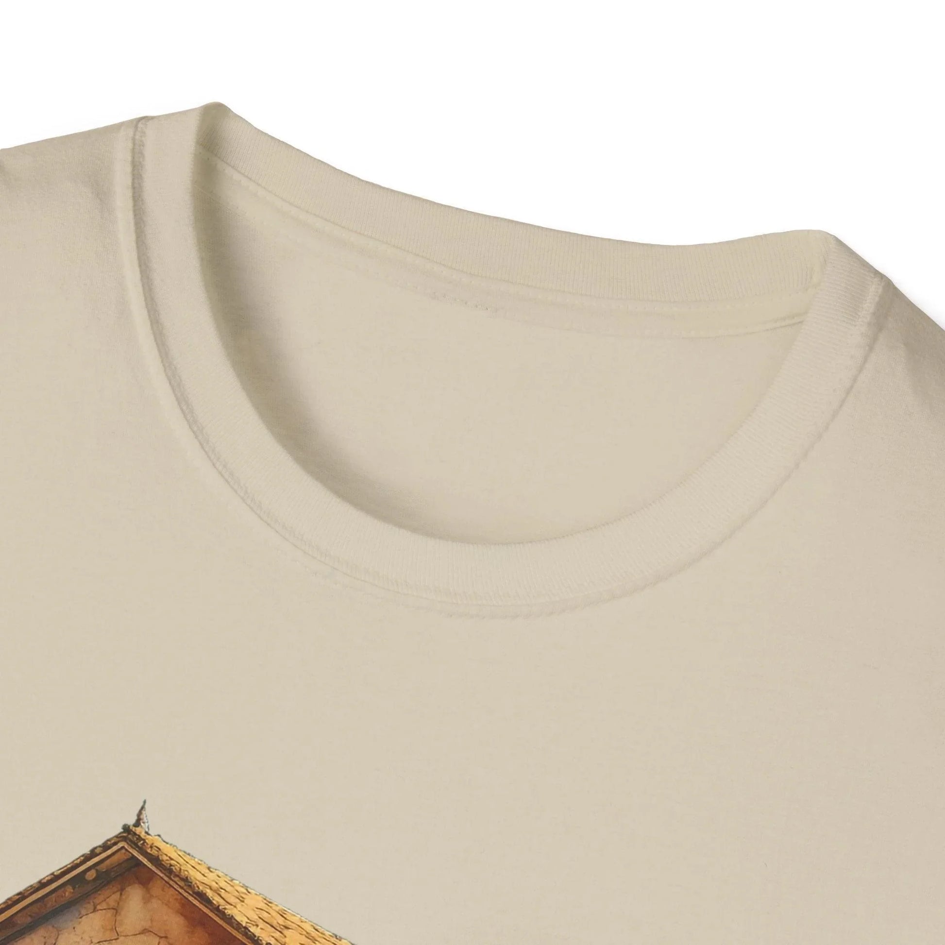 Close-up of the relaxed fit, charcoal gray unisex T-shirt's neckline and subtle fabric texture from a slightly elevated