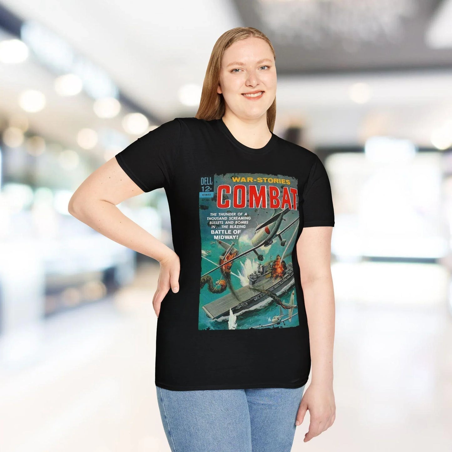 Close-up of the Combat Dec 1963 unisex softstyle T-shirt’s smooth cotton fabric and relaxed fit at the sleeve hem in vibrant