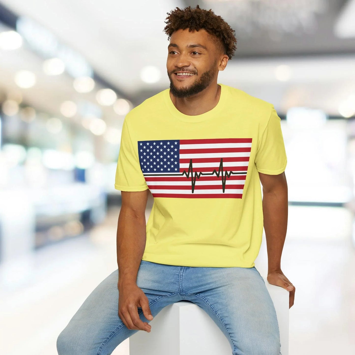 Close-up of the American Flag Heartbeat graphic on the chest, showcasing vibrant colors and crisp print details on the