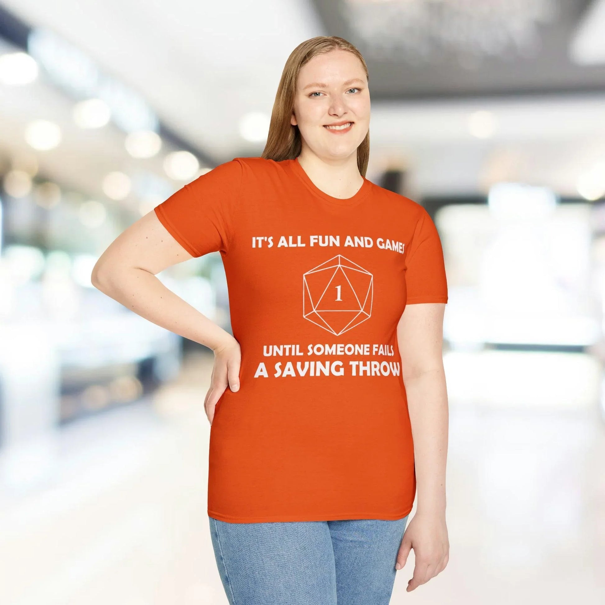 Close-up of the White All Fun and Games unisex T-shirt fabric showing soft cotton texture and subtle stitching detail at the