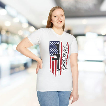 Close-up of the distressed American flag print on the front chest of the relaxed-fit, soft cotton T-shirt featuring vibrant