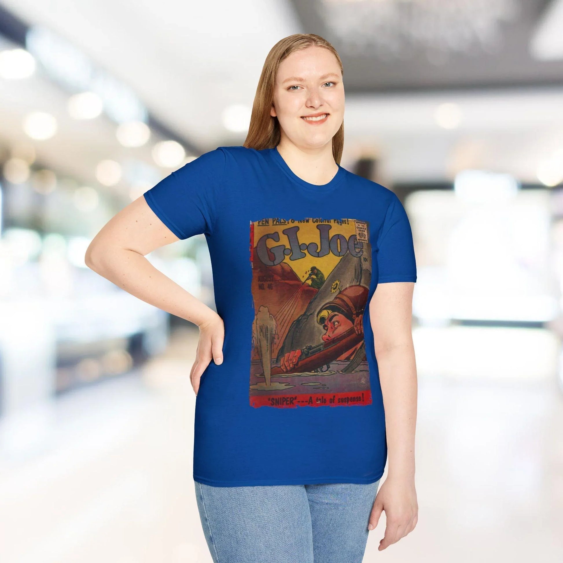 Close-up of the G.I. Joe No.46 softstyle T-shirt’s tag showing fabric blend and size details on the creamy beige fabric.