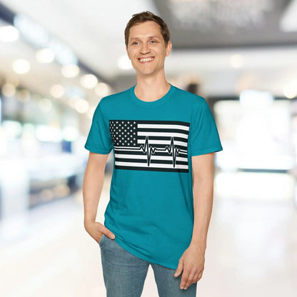Close-up of the black-and-white American flag heartbeat design on the unisex softstyle T-shirt fabric with visible stitching