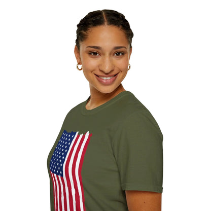 Close-up of distressed vertical American flag print on the soft, relaxed fit T-shirt’s chest area, highlighting fading and