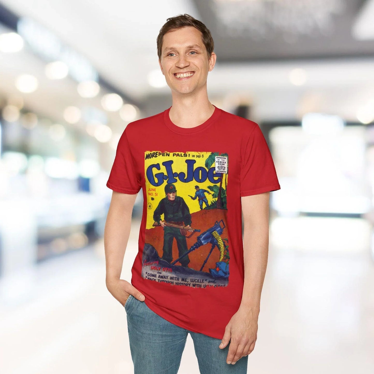 Close-up of the unisex softstyle T-shirt's lowercase G graphic and subtle seam stitching on the relaxed fit, showcasing