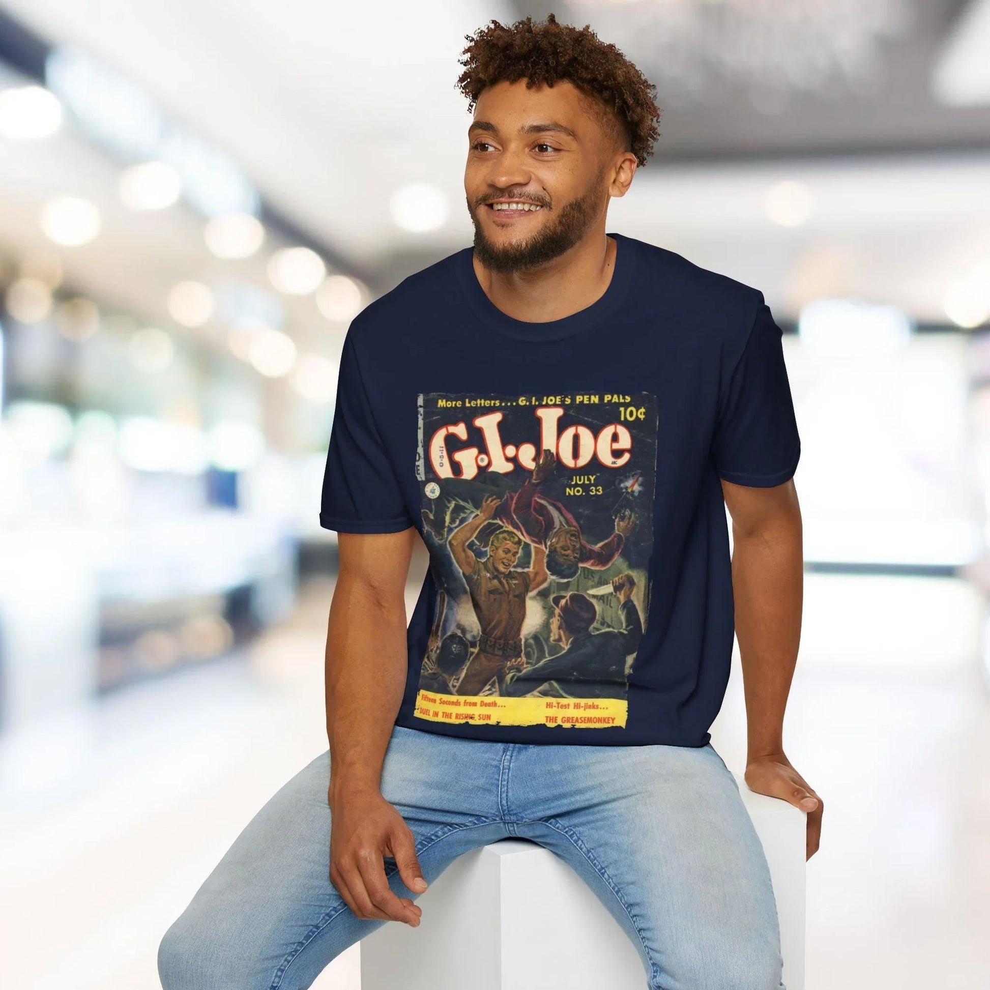 Close-up of the G.I. Joe No.33 softstyle T-shirt’s fabric texture and subtle heathered blue color from a top-down