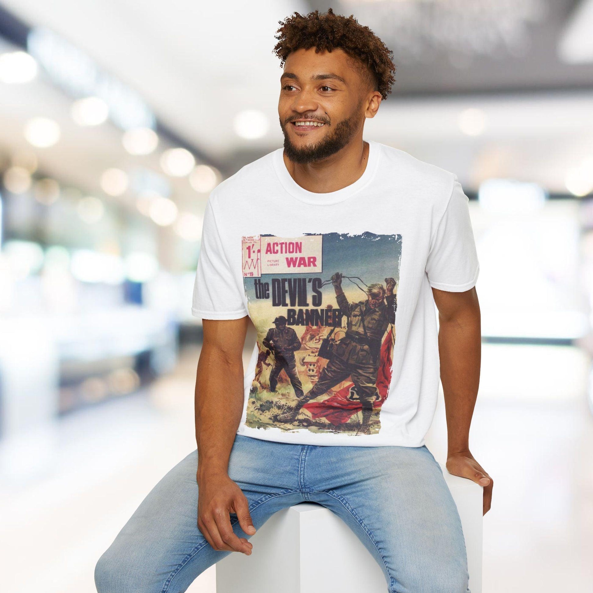 Close-up of the unisex softstyle T-shirt’s hem showing smooth stitching and vibrant navy color from a bottom-front angle.