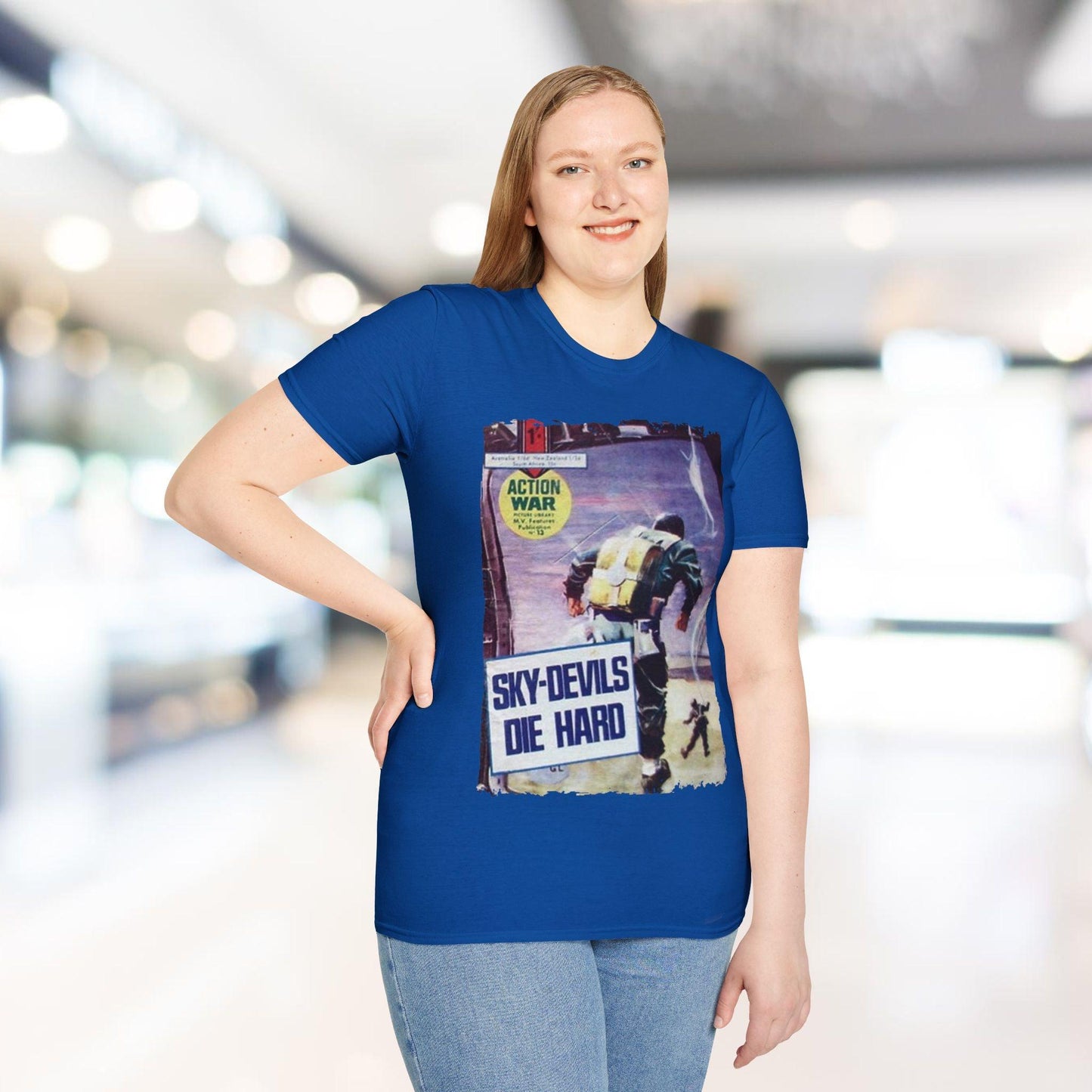 Close-up of the unisex softstyle T-shirt's fabric texture highlighting the smooth, relaxed fit and rich navy color from a