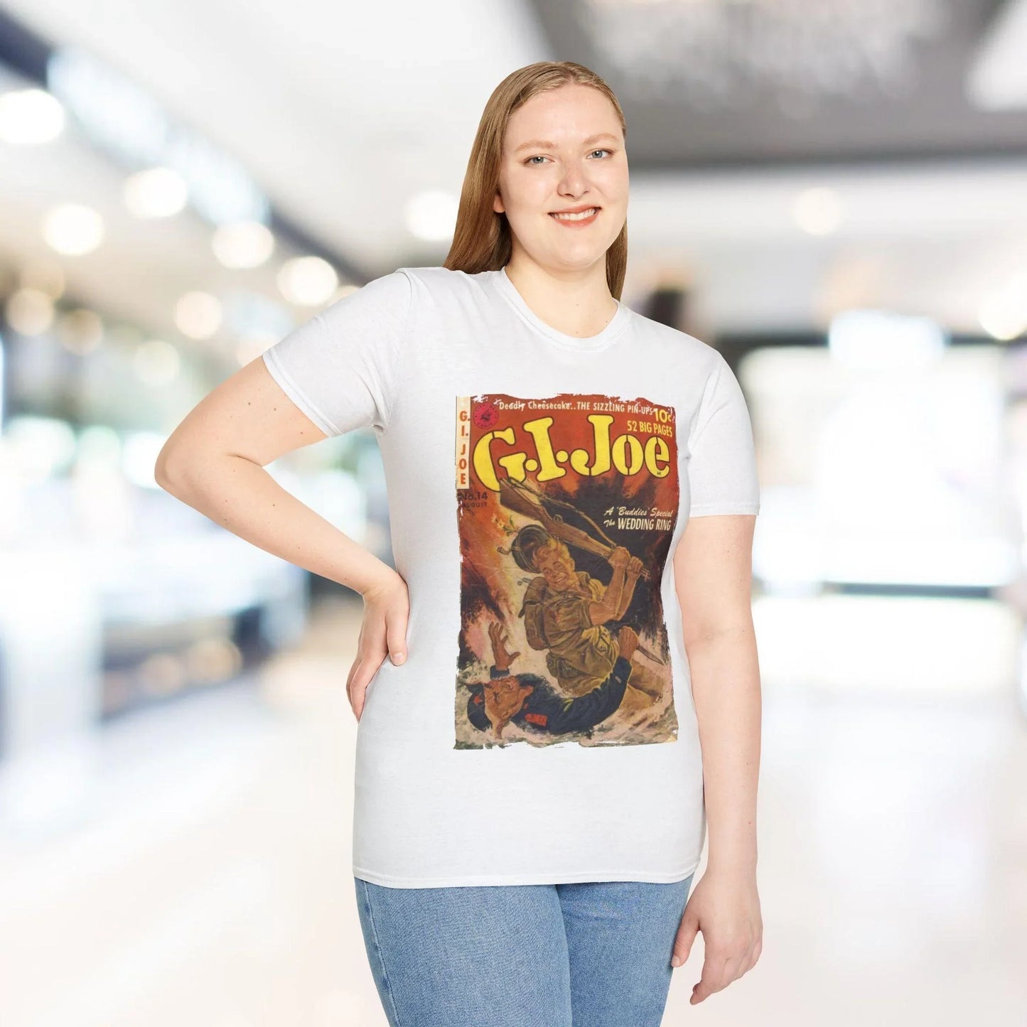 Close-up of the G.I. Joe No.14 logo printed on soft grey cotton fabric at the hem, highlighting subtle stitching details and