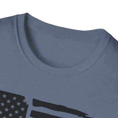 Close-up of the distressed black-and-white American flag graphic on front of the unisex softstyle T-shirt’s chest area