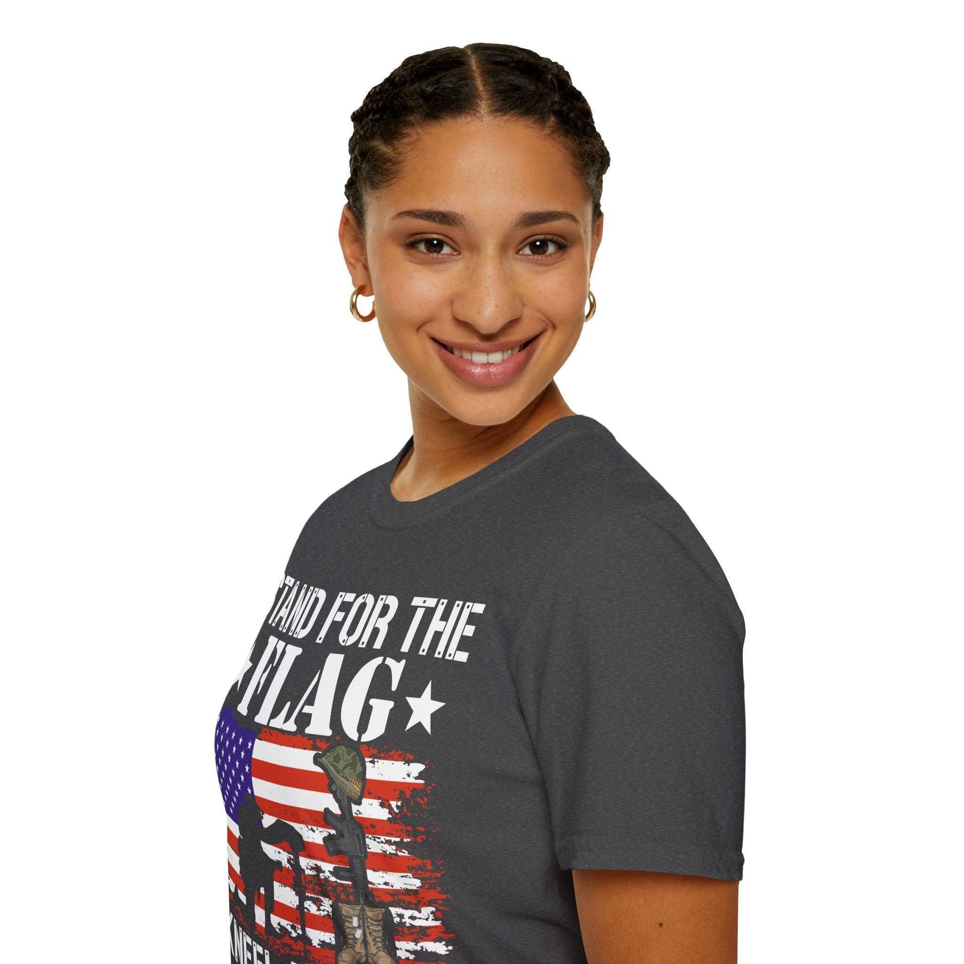 Close-up of the unisex relaxed fit T-shirt's front neckline and subtle fabric texture in deep charcoal color