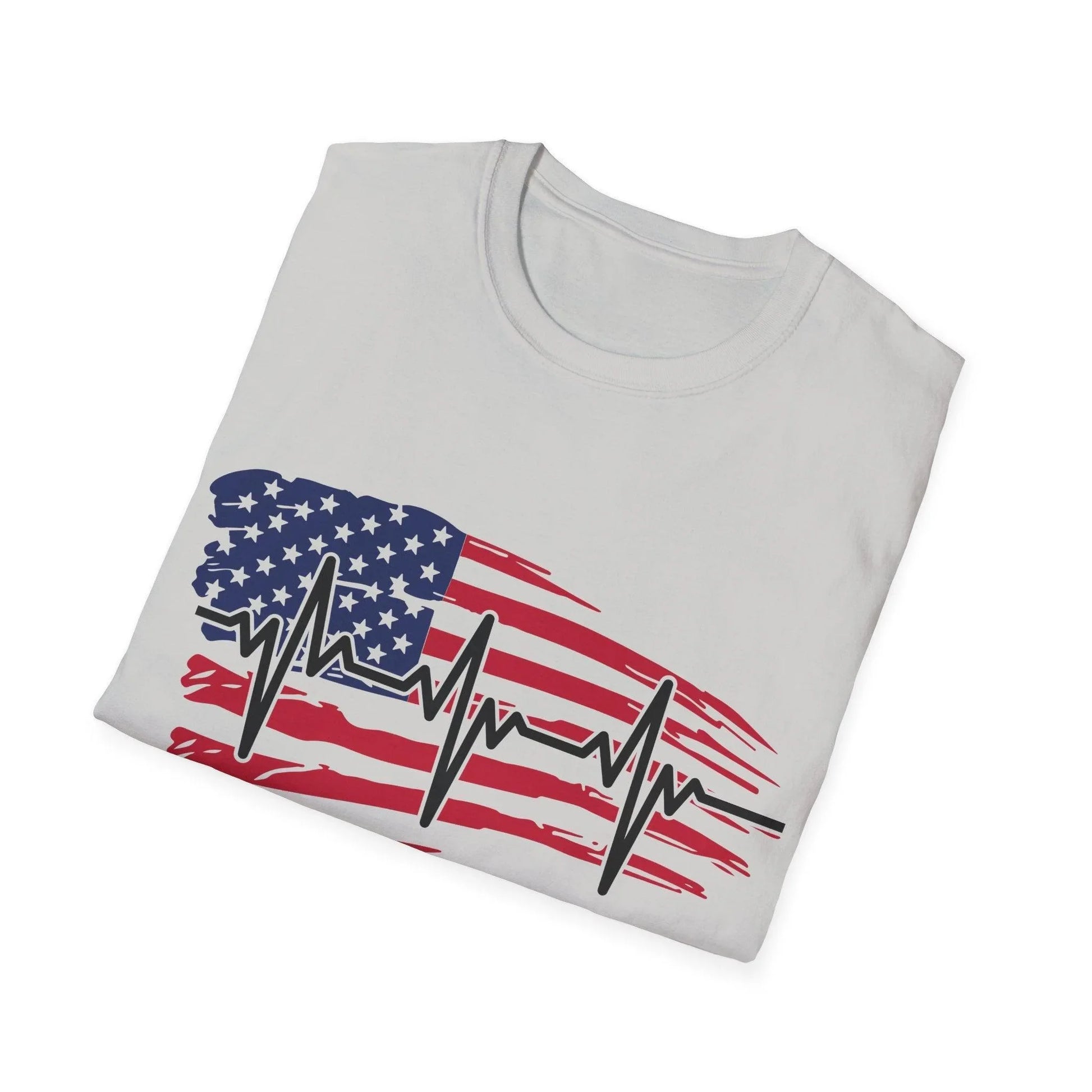 Close-up of the distressed American flag heartbeat print on unisex softstyle T-shirt's chest area, showcasing textured