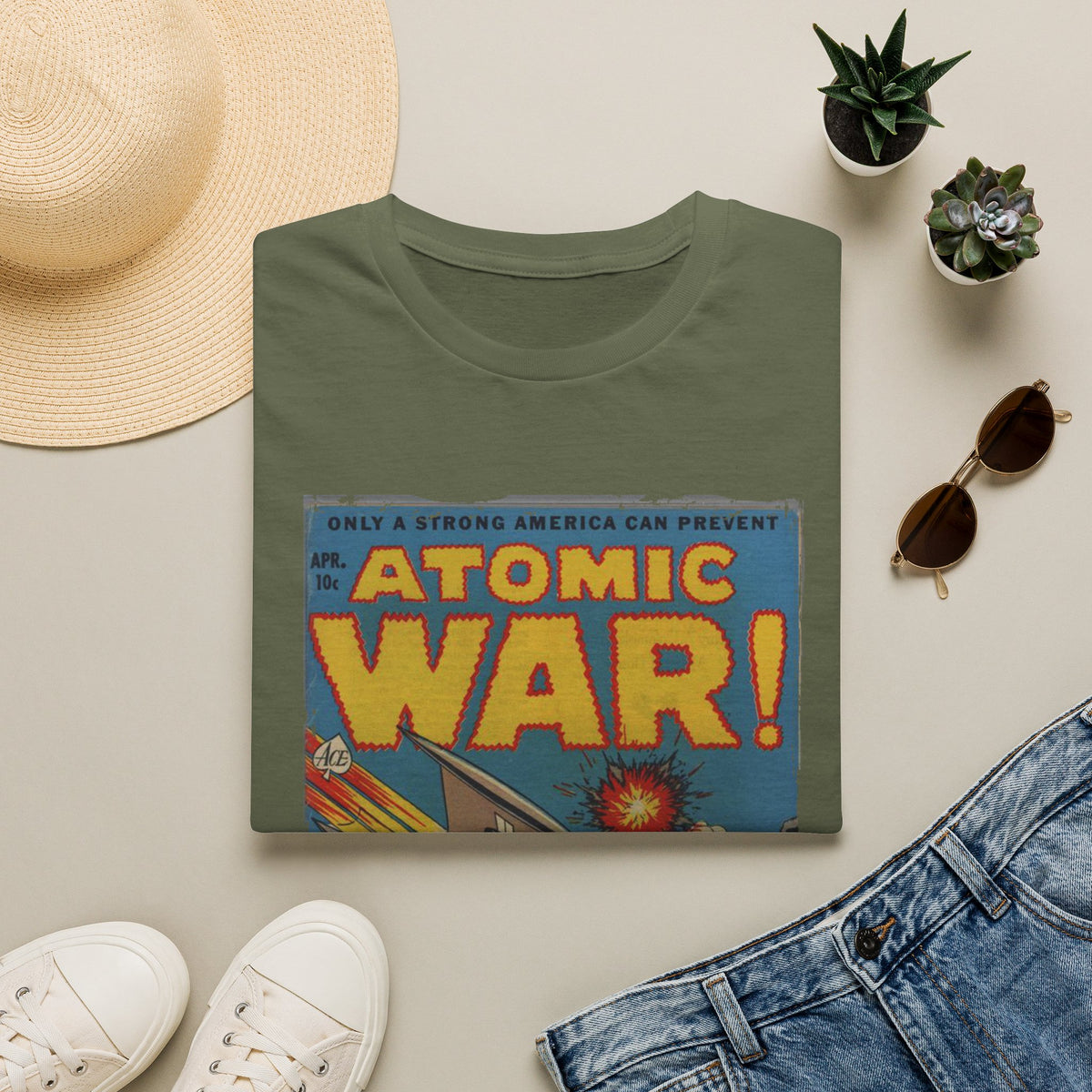 Close-up of colorful atomic explosion print on the chest area of the relaxed fit, heather gray cotton T-shirt from a