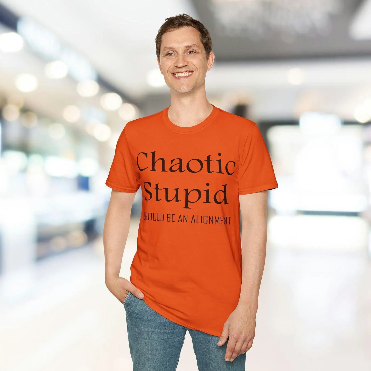 Close-up of the black unisex softstyle fabric showing subtle smooth texture and precise stitching along the neckline.