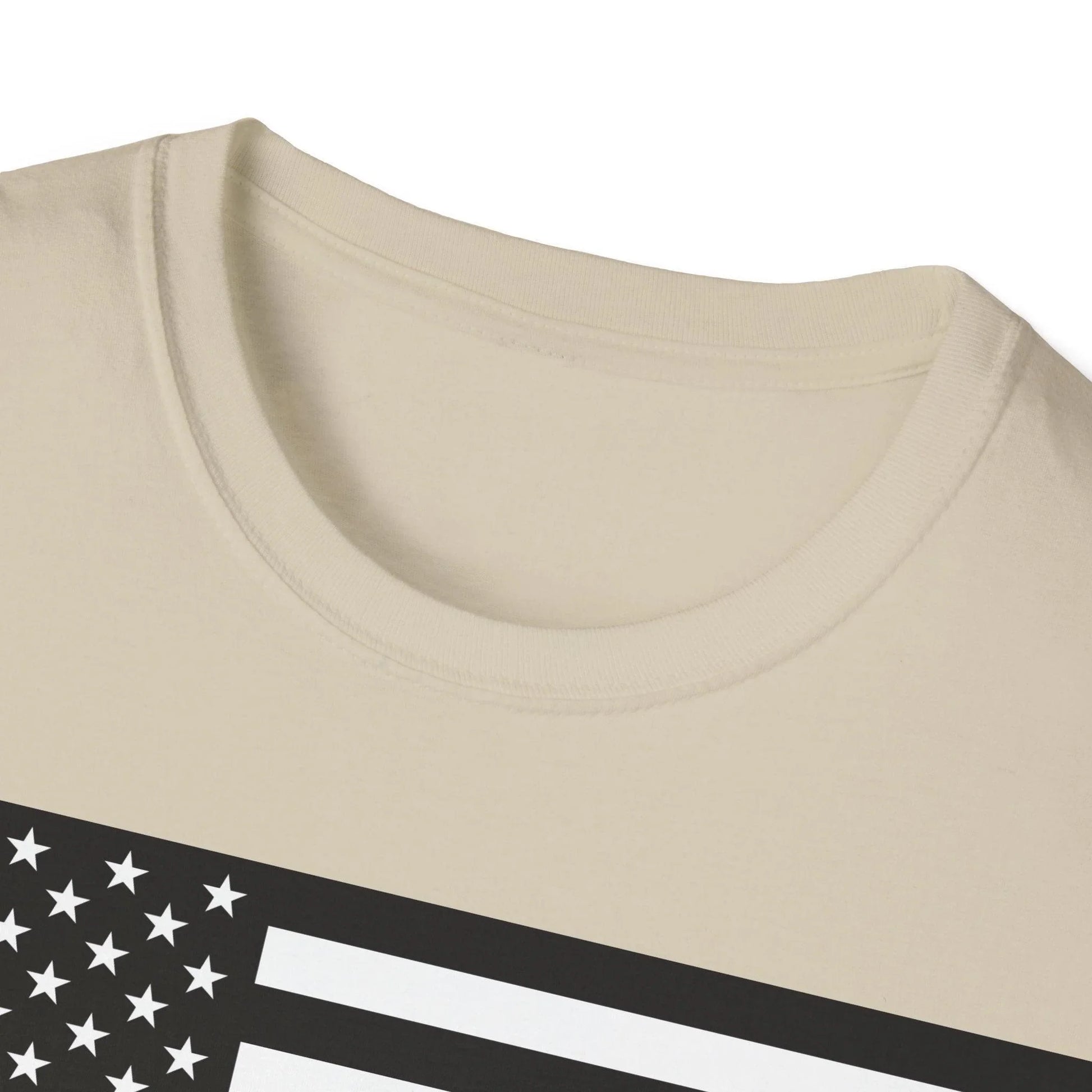 Close-up of black and white American flag heartbeat graphic on the chest, showcasing intricate line details and crisp print