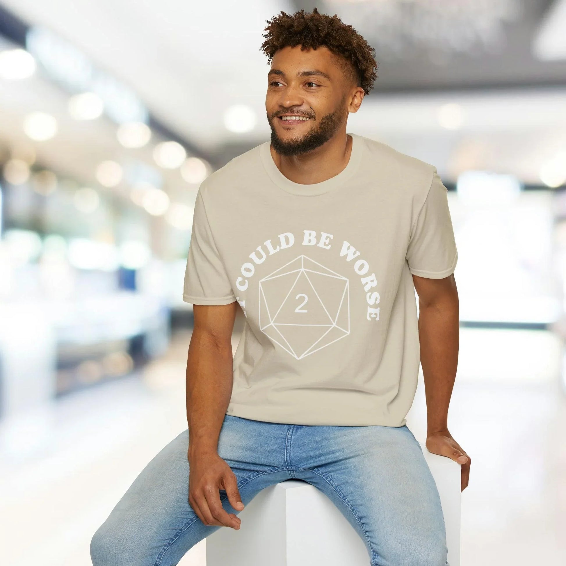 Close-up of the white unisex softstyle T-shirt’s neckline and fabric texture, highlighting smooth stitching and relaxed fit