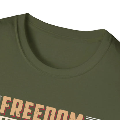 Close-up of the unisex slim fit T-shirt’s chest print featuring distressed "Freedom Isn't Free" lettering on vibrant navy