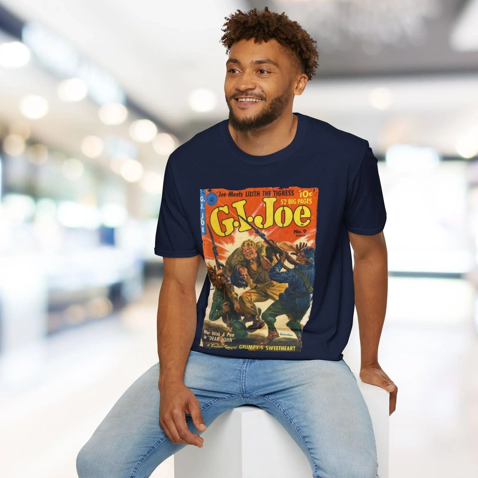 Close-up of the G.I. Joe No.9 unisex softstyle T-shirt’s fabric detail in navy blue, highlighting smooth jersey knit texture