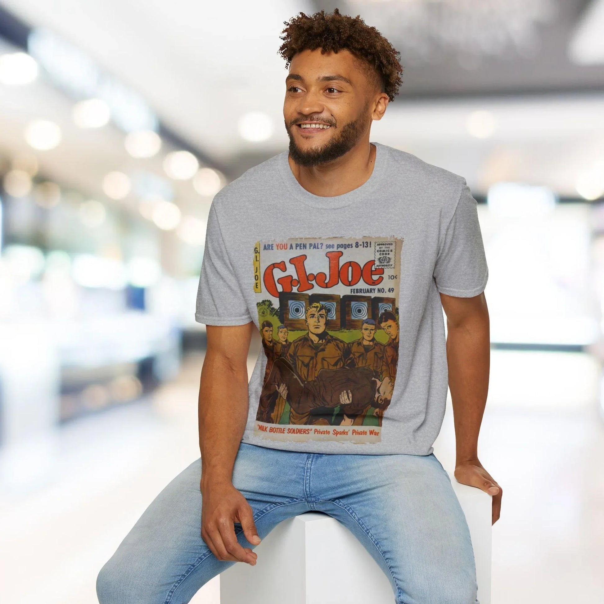 Close-up of the T-shirt's neck ribbing showing subtle stitching and fabric texture in vibrant teal color.