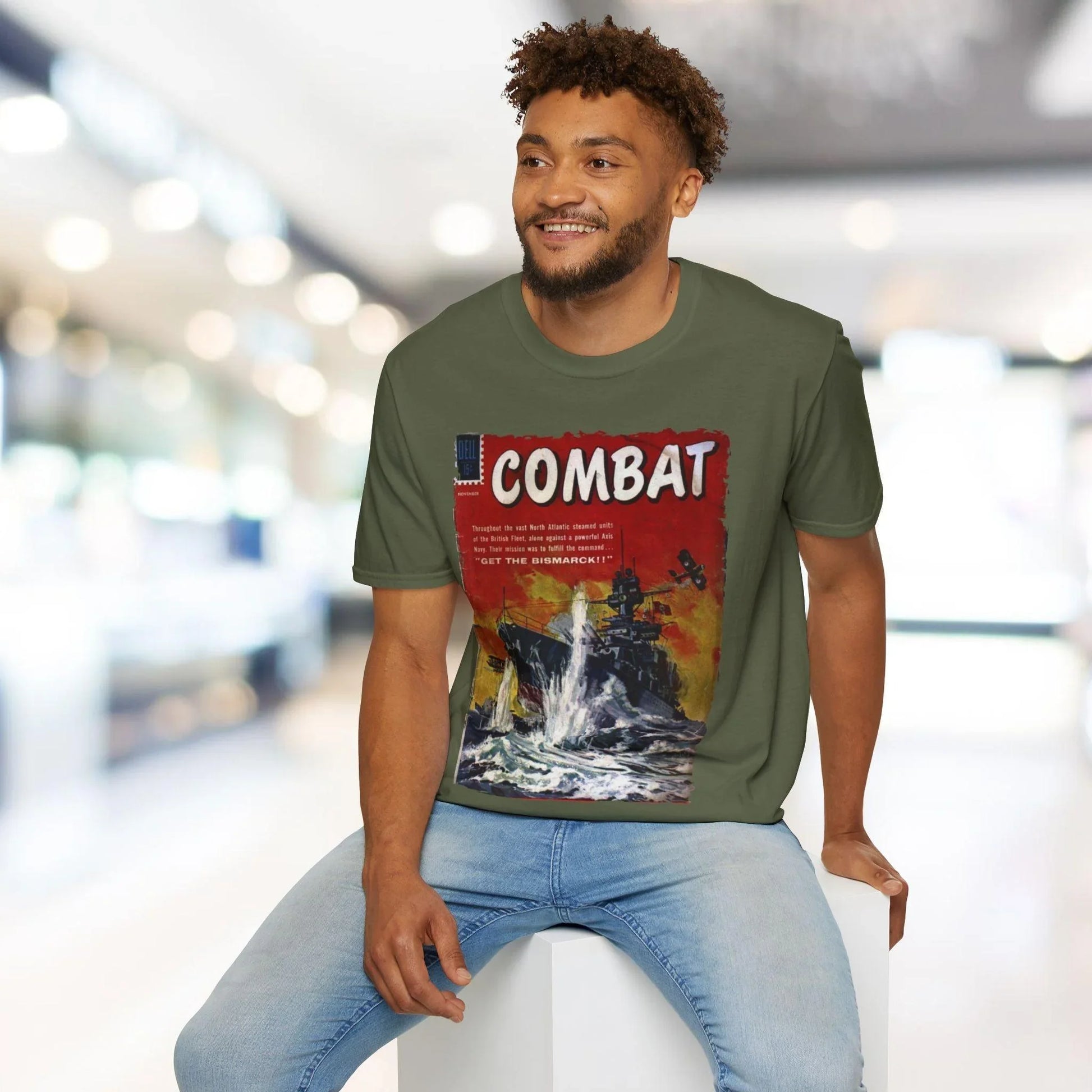 Close-up of the Combat Nov 1961 T-shirt's woven neck tag featuring logo and size details on soft cotton fabric.