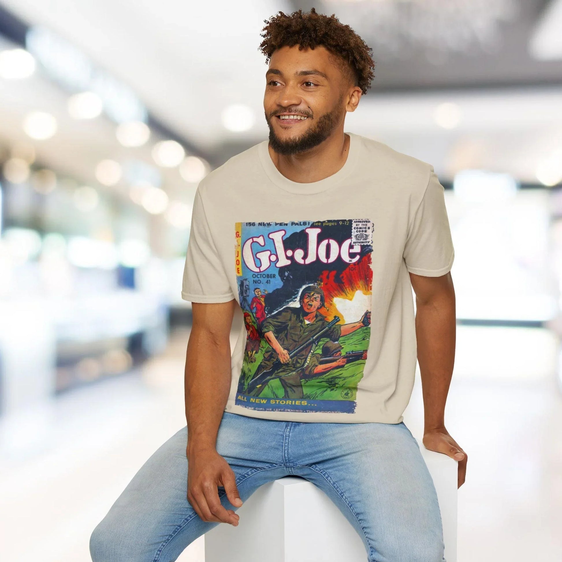 Close-up of the unisex softstyle T-shirt's vibrant navy color and smooth fabric texture, highlighting the slim fit and crew
