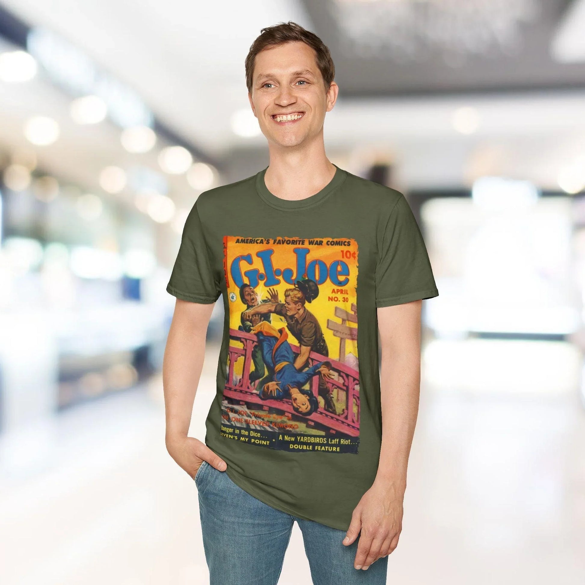 Close-up of the G.I. Joe No.30 softstyle T-shirt fabric showing smooth cotton blend texture and vibrant navy color from a