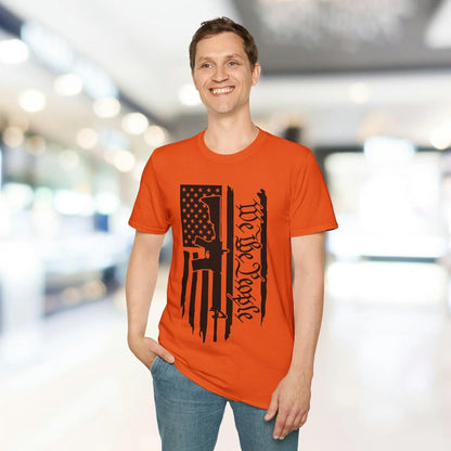 Close-up of distressed black-and-white American flag graphic on soft cotton fabric showing textured detail and weathered