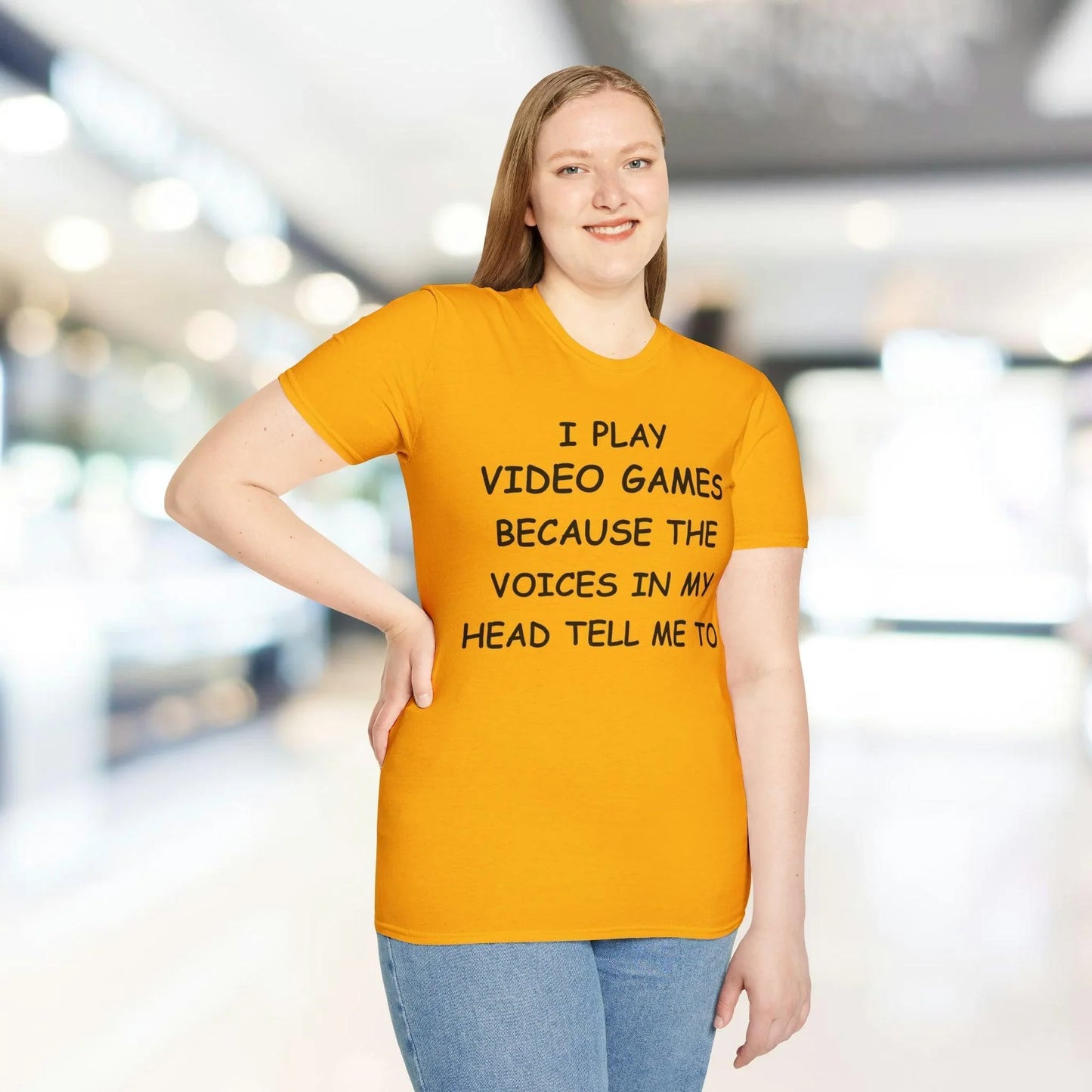 Close-up of the black unisex softstyle T-shirt fabric showing smooth texture and neatly stitched collar detail from a