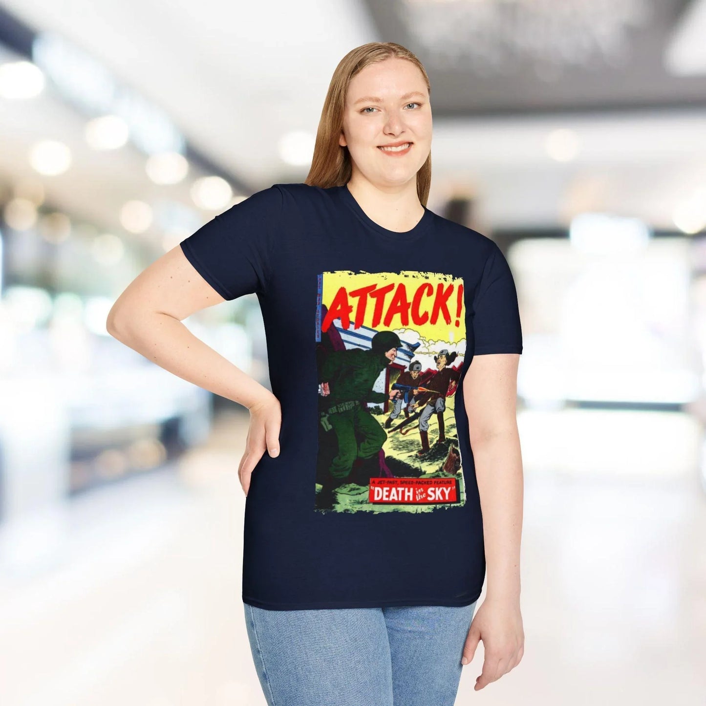 Close-up of the Attack! No. 7 unisex softstyle T-shirt neckline highlighting the smooth ribbed collar and vibrant graphic