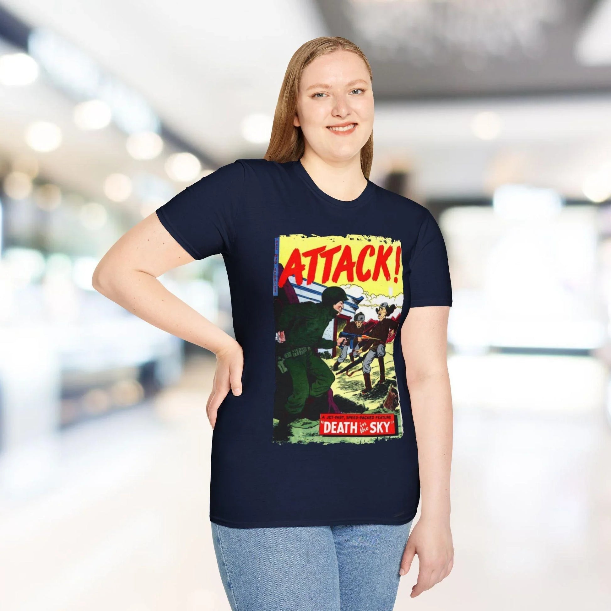 Close-up of the Attack! No. 7 unisex softstyle T-shirt neckline highlighting the smooth ribbed collar and vibrant graphic