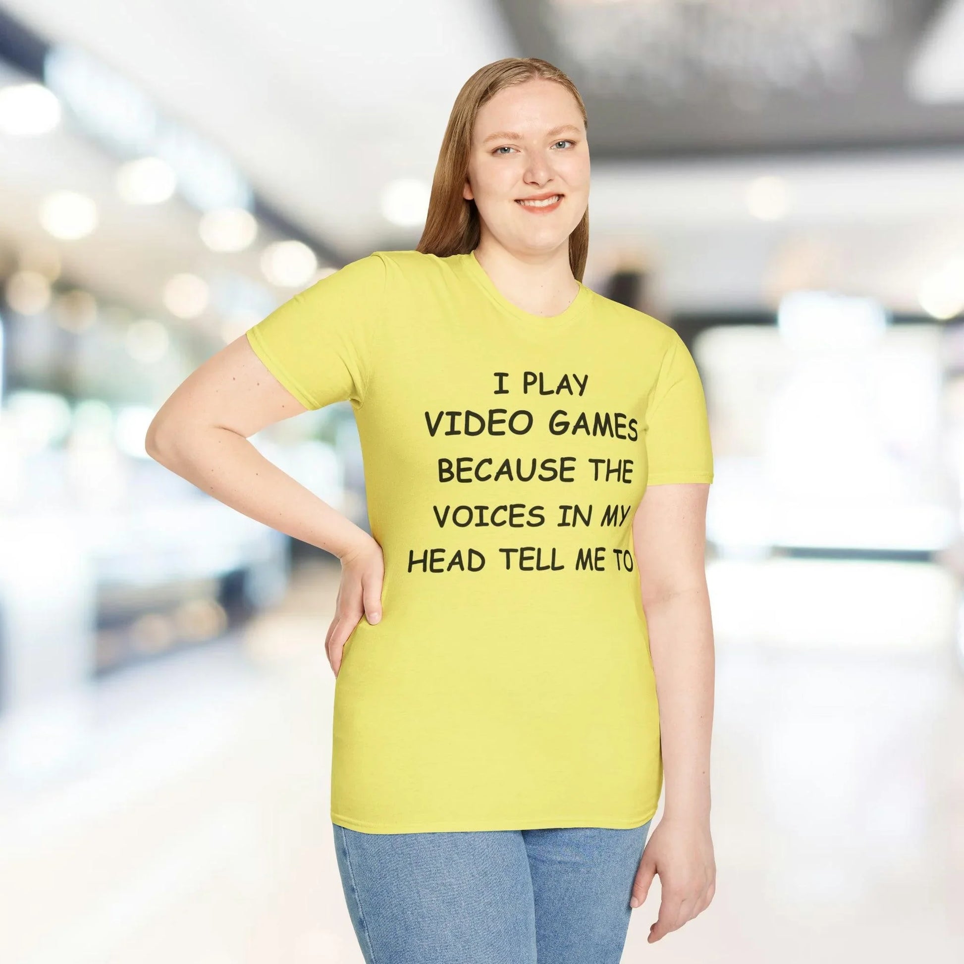 Close-up of the black unisex softstyle T-shirt's reinforced crew neckline and smooth fabric texture from a slightly lower