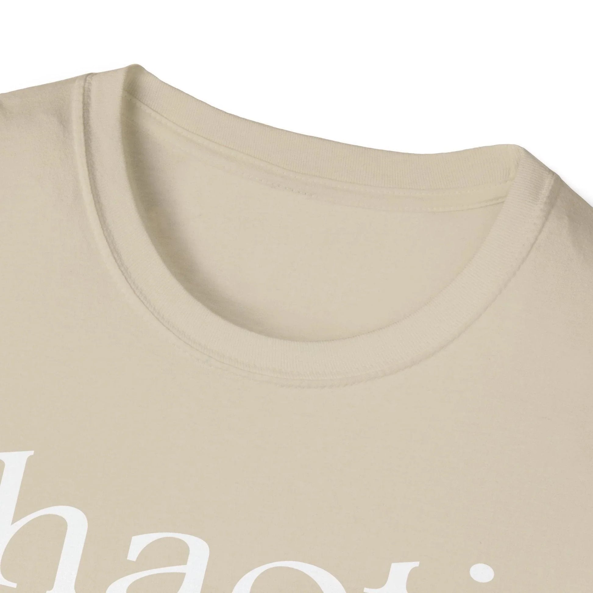Close-up of the white fabric showing the smooth, soft texture and subtle weave pattern of the unisex fit T-shirt's cotton