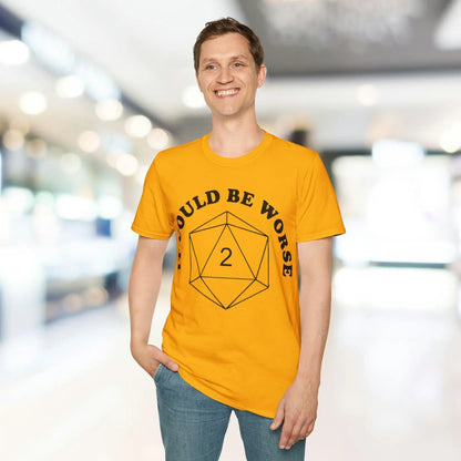 Close-up of the black unisex softstyle T-shirt's smooth fabric texture and subtle stitching along the neckline from a