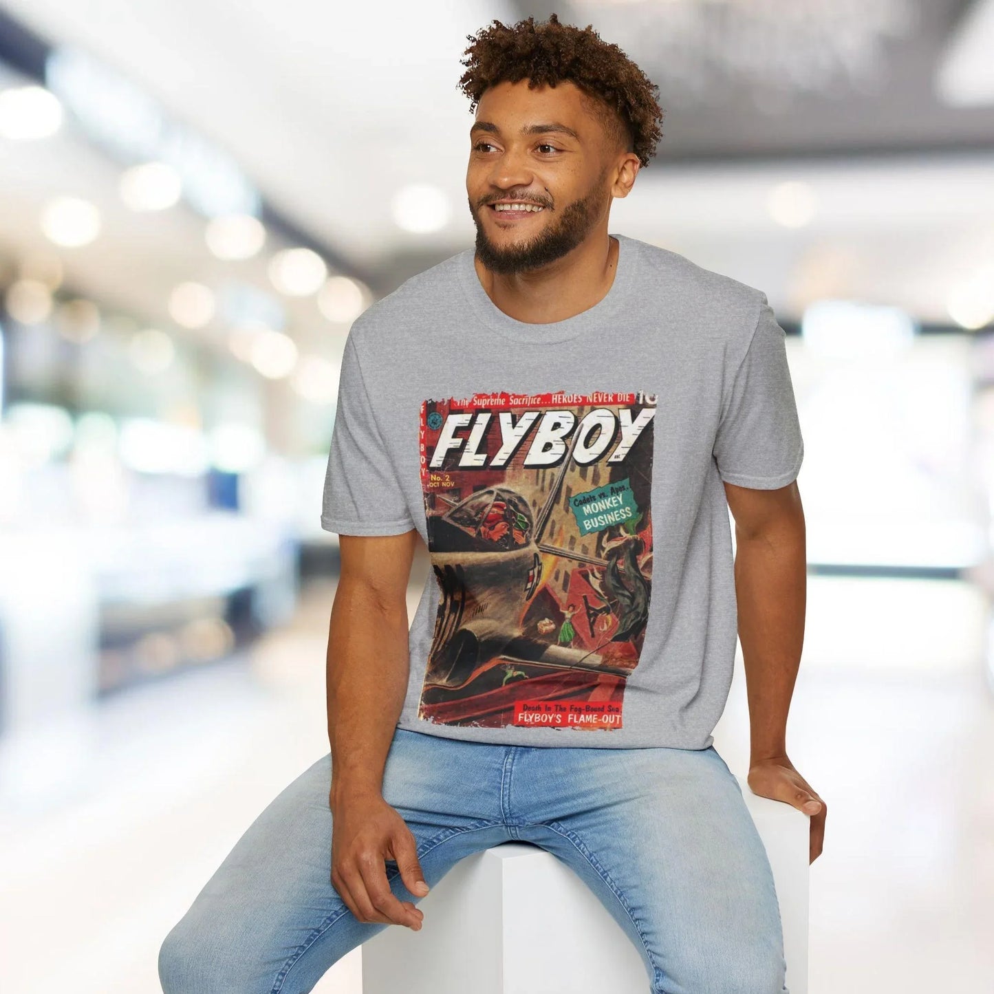 Close-up of the Flyboy No.2 unisex softstyle T-shirt fabric showcasing smooth charcoal-colored cotton with subtle ribbed