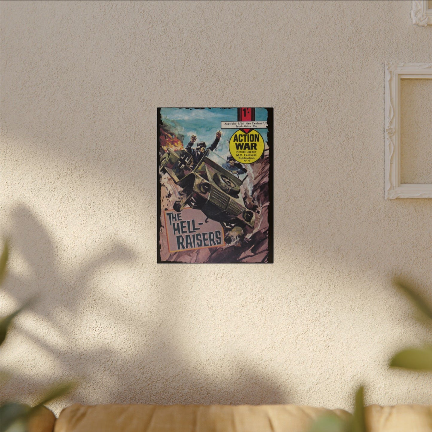 Close-up of the textured canvas surface featuring the "Action War #9" comic title and vibrant orange and blue color accents.